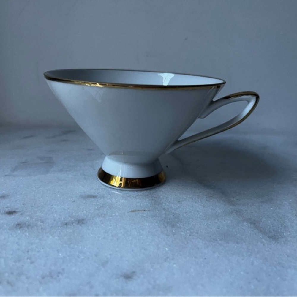 Elegant White floral Teacup with Gold Trim